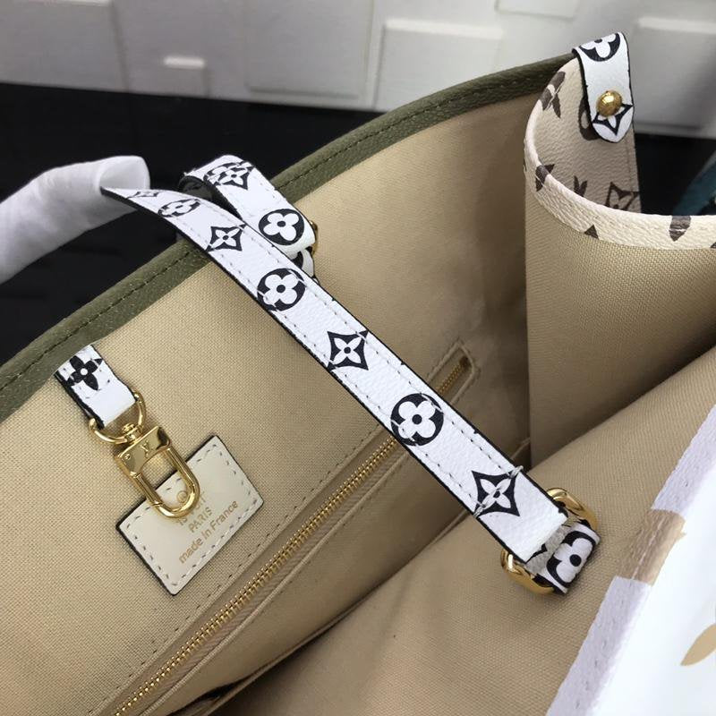ONTHEGO GM 41 KAKI BLANC BEIGE MONOGRAMME TOILE ENDUITE GÉANTE