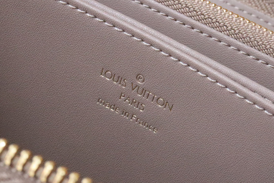 PORTEFEUILLE ZIPPY 19 EN CUIR D'AGNEAU GAUFRÉ BEIGE