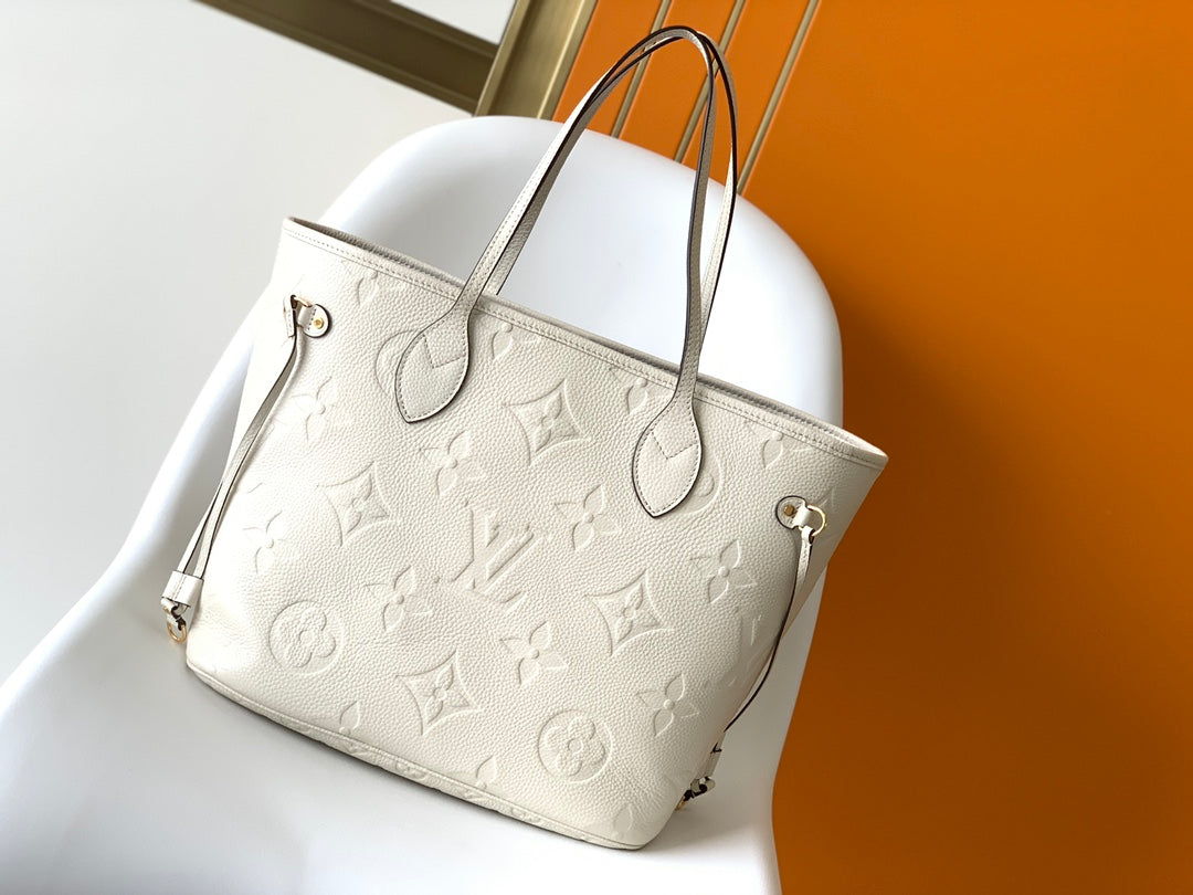 NEVERFULL MM 32 CUIR EMPREINTE MONOGRAMME BLANC