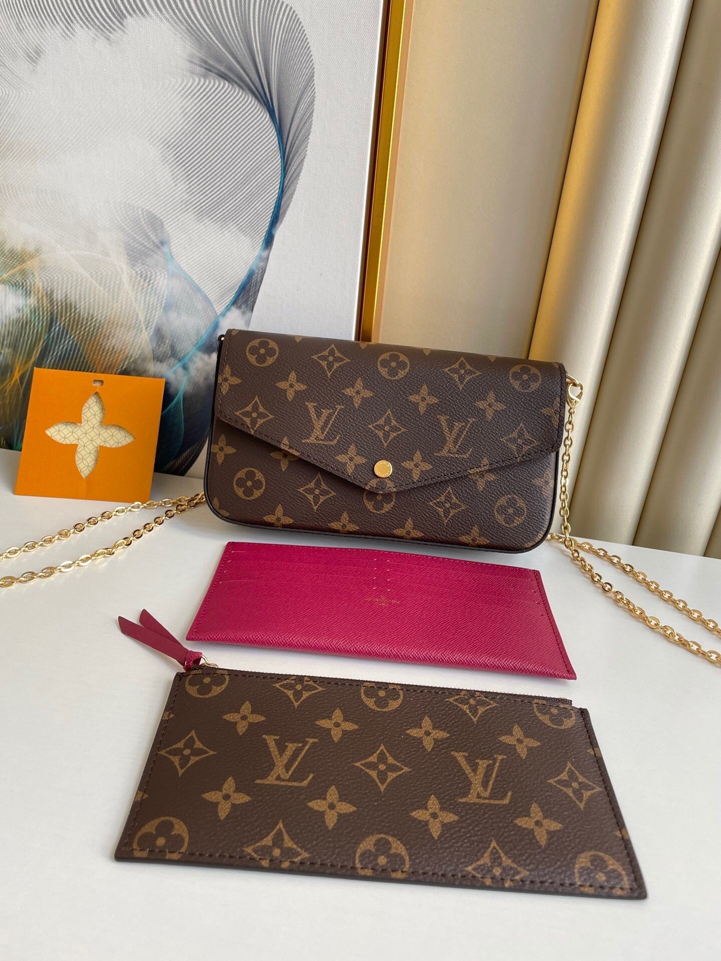 POCHETTE FÉLICIE 21 EN TOILE MONOGRAMME MARRON QUINCAILLERIE DORÉ