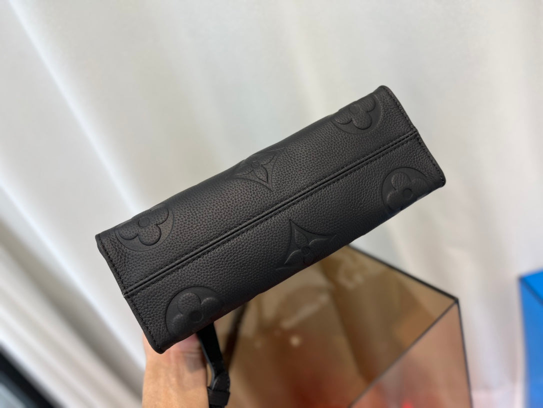 onthego 25 est ouest noir monogramme empreinte