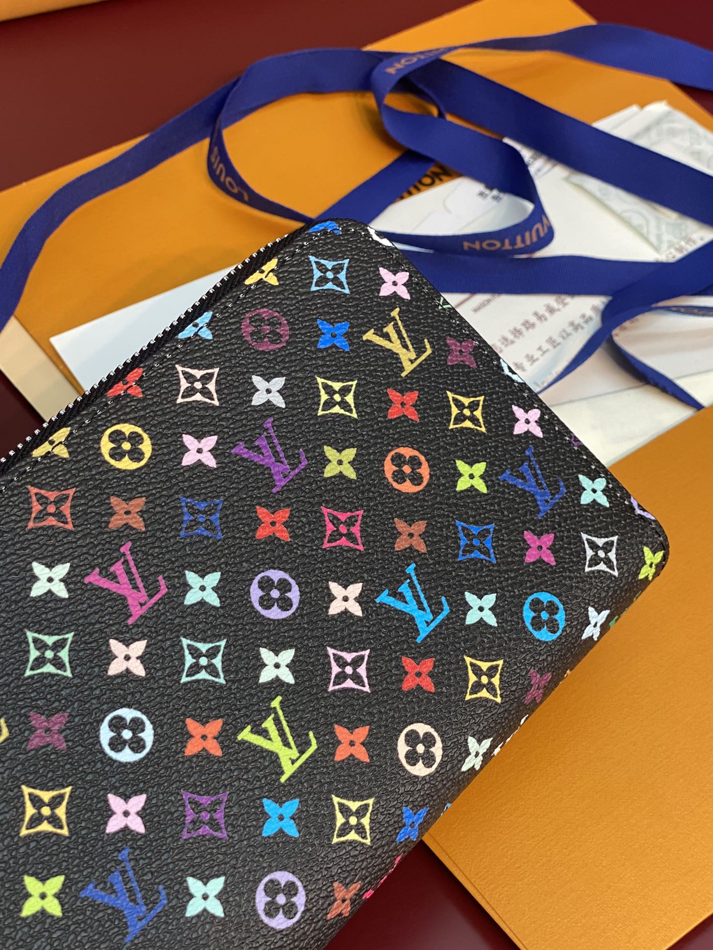 Portefeuille zippé LV x TM en toile monogrammée noire et multicolore