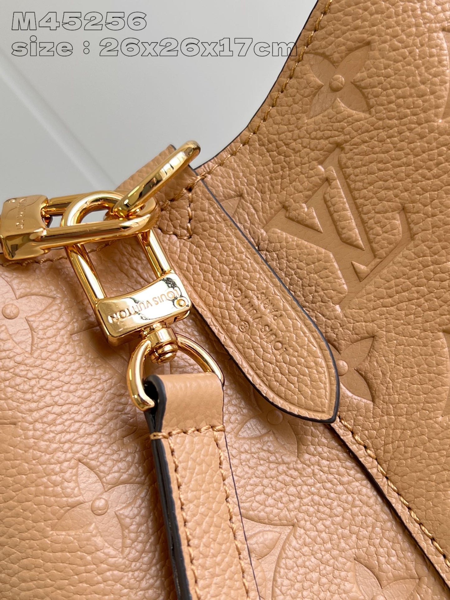 Sac seau LV Neo Noe 26 cm en cuir de veau marron et blanc monogramme