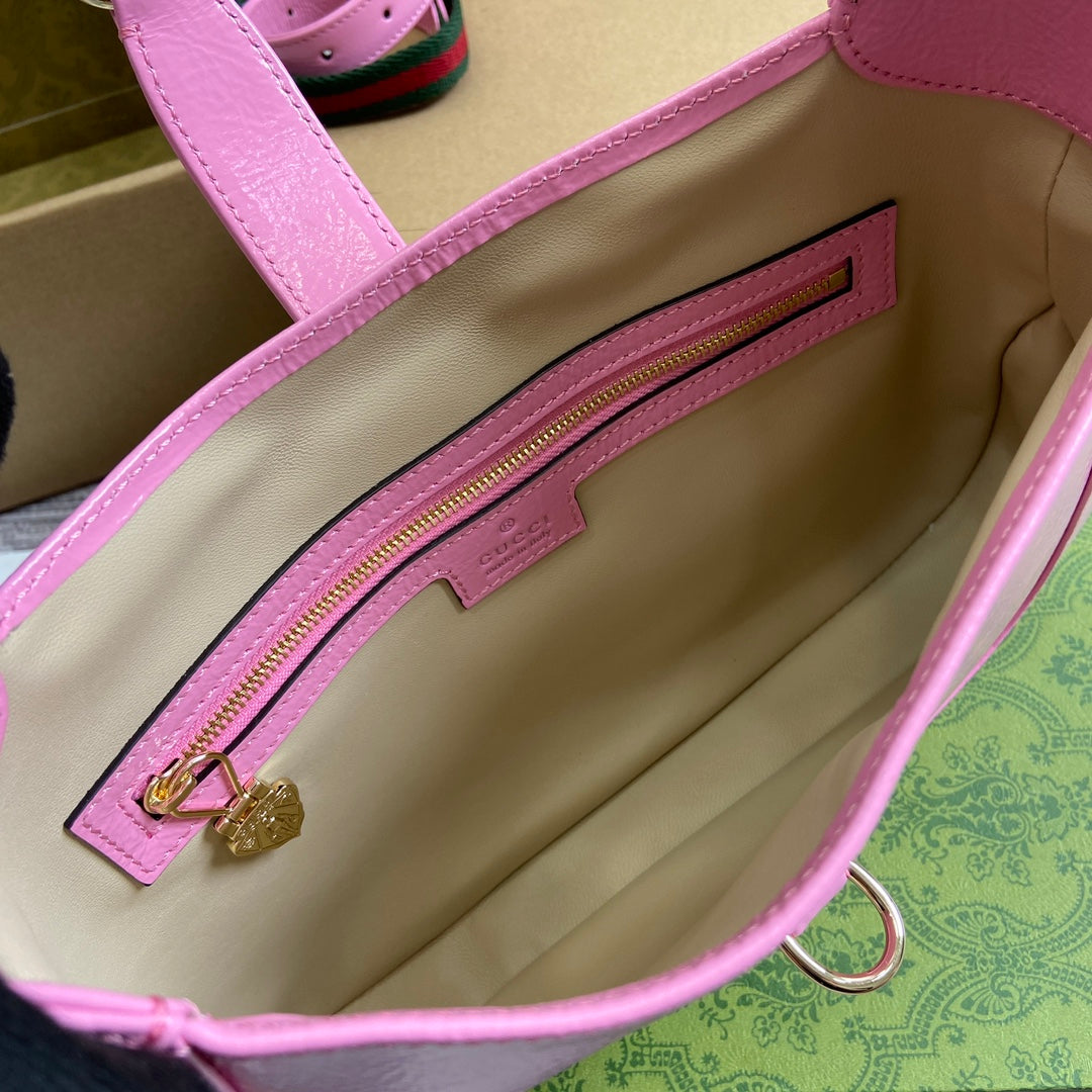 Petit sac bandoulière Jackie 27 en cuir de veau laqué craquelé rose, accessoires dorés