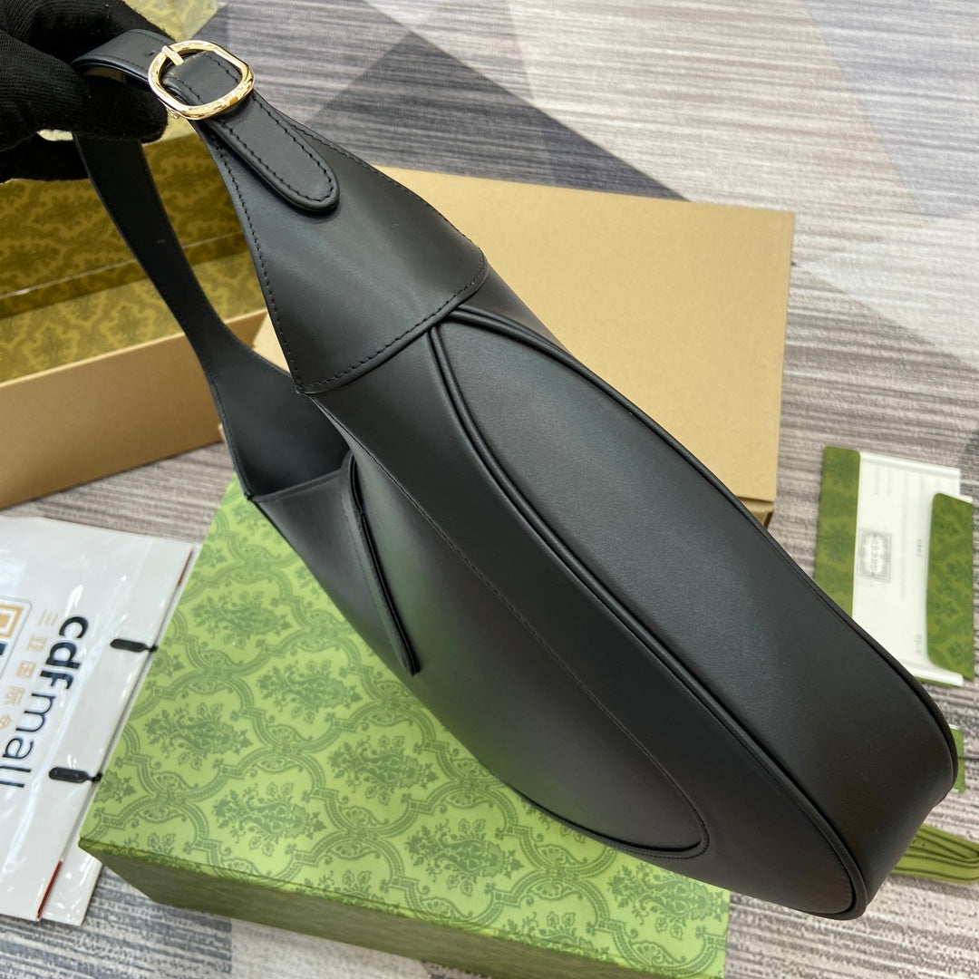 Sac bandoulière Jackie Medium 35 en cuir de veau noir et métal doré