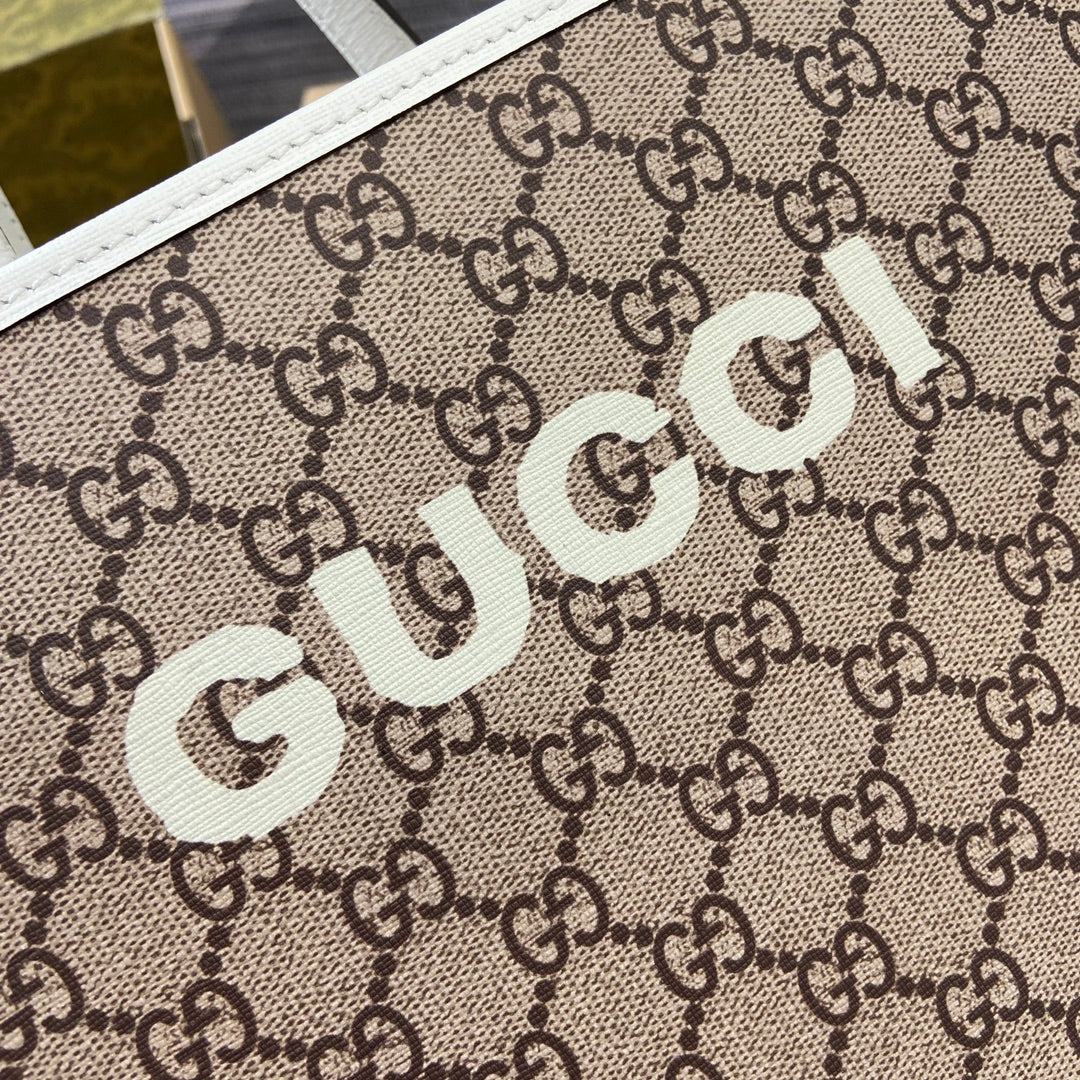 SAC CABAS 28 IMPRIMÉ ANIMALIER EN TOILE BEIGE ET BORDURE EN CUIR DE VEAU BLANC