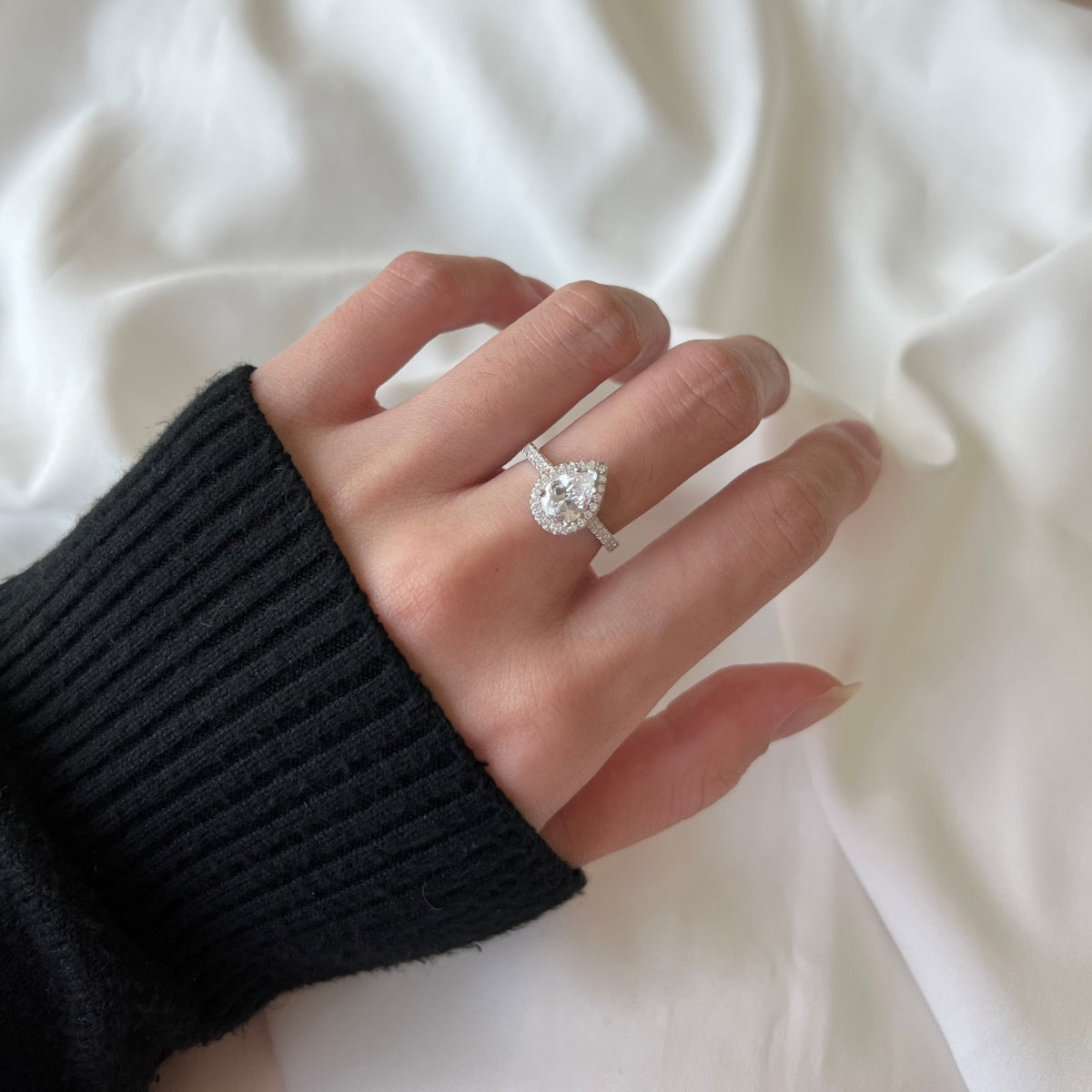 [HOT]1.0カラットの豪華な輝くウォータードロップシェイプの結婚指輪