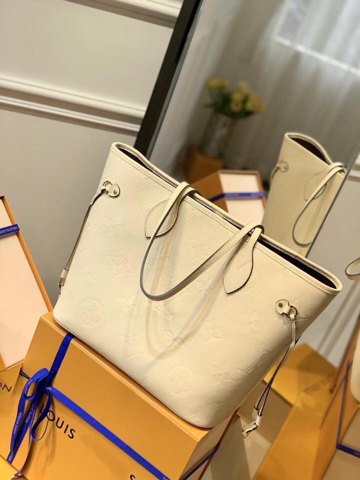 NEVERFULL MM 32 CUIR DE VACHE GAUFRÉ CRÈME 