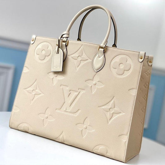 ONTHEGO GM 41 CRÈME MONOGRAMME EMPREINTE TOILE GÉANTE