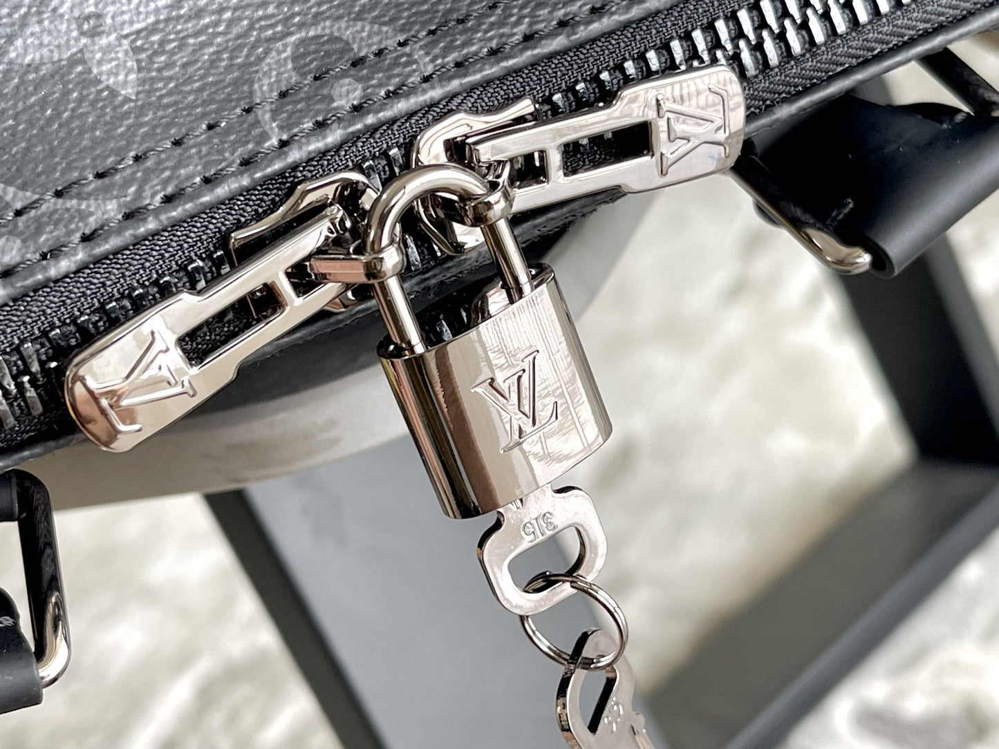 KEEPALL 45 BANDOULIÈRE MONOGRAMME ÉCLIPSE