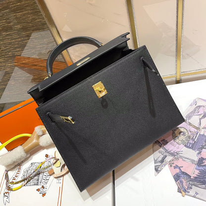 Sac HM Kelly 25 cm en cuir EPSOM noir et matériel doré