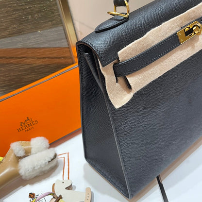 Sac HM Kelly 25 cm en cuir EPSOM noir et matériel doré