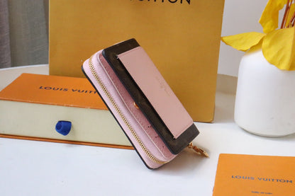 PORTEFEUILLE LOU 11,5 CM EN TOILE MONOGRAMME MARRON ROSE