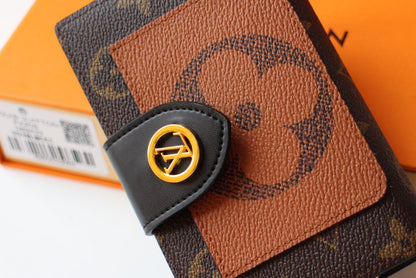 PORTEFEUILLE JULIETTE 13,5 EN TOILE MONOGRAMME MARRON ORANGE