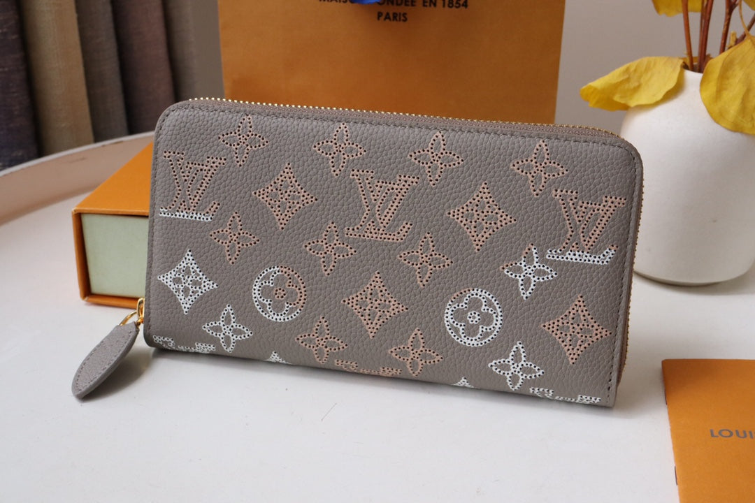 PORTEFEUILLE ZIPPY 19,5 EN CUIR MAHINA