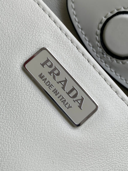 SAC À BANDOULIÈRE CLEO 30 EN CUIR BROSSÉ BLANC NOIR 
