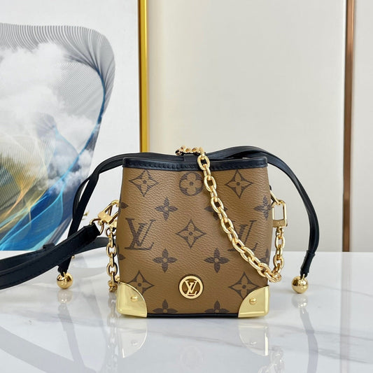 SAC À MAIN NOE 11,5 NANO CHARM MARRON MONOGRAMME EN TOILE INVERSÉE 