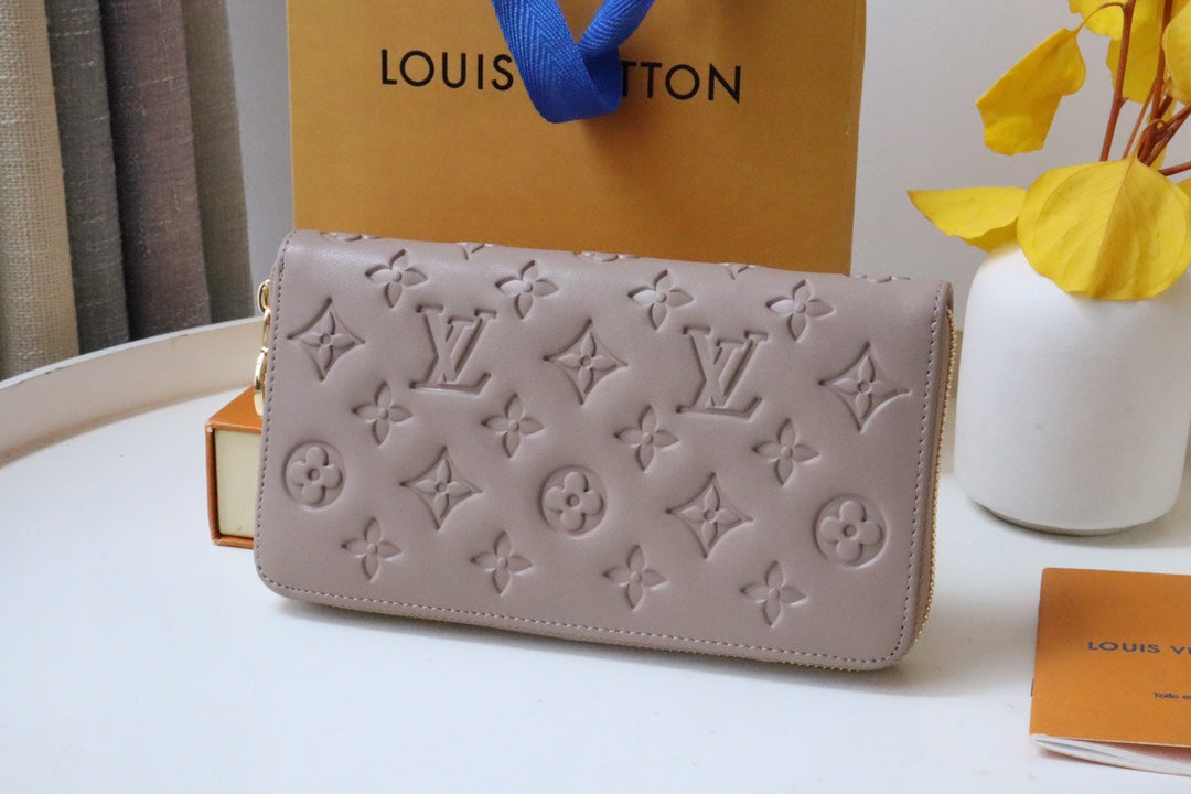 PORTEFEUILLE ZIPPY 19 EN CUIR D'AGNEAU GAUFRÉ BEIGE