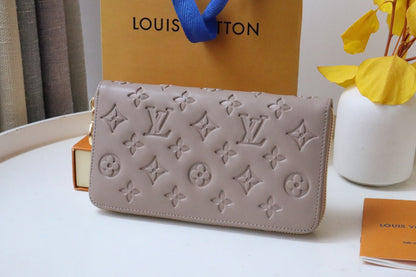 PORTEFEUILLE ZIPPY 19 EN CUIR D'AGNEAU GAUFRÉ BEIGE