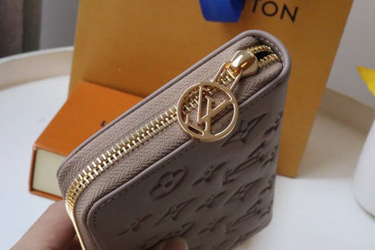 PORTEFEUILLE ZIPPY 19 EN CUIR D'AGNEAU GAUFRÉ BEIGE