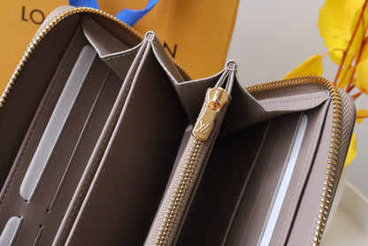 PORTEFEUILLE ZIPPY 19 EN CUIR D'AGNEAU GAUFRÉ BEIGE