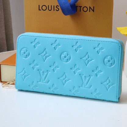 PORTEFEUILLE ZIPPY 19 BLEU NUAGE EN CUIR D'AGNEAU GAUFRÉ