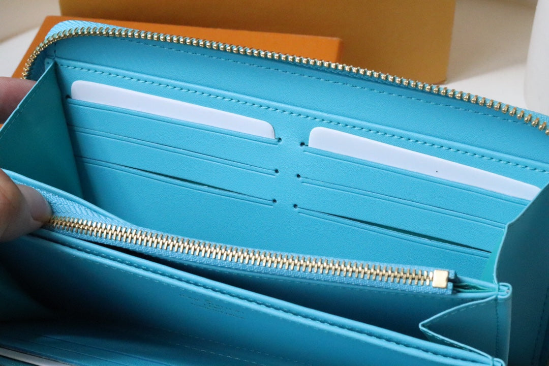 PORTEFEUILLE ZIPPY 19 BLEU NUAGE EN CUIR D'AGNEAU GAUFRÉ
