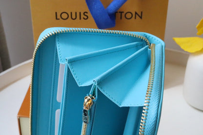 PORTEFEUILLE ZIPPY 19 BLEU NUAGE EN CUIR D'AGNEAU GAUFRÉ