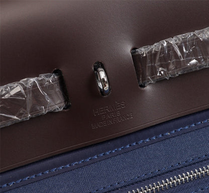 HM ハーブバッグ ジップ 31 ネイビー＆チョコレート キャンバス