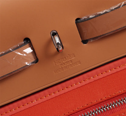 HM HERBAG ZIP 31 TOILE ROUGE ORANGE ET CUIVRE