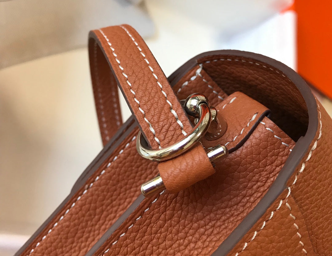 HM SAC ROULIS 18 CUIR TOGO CIDRE