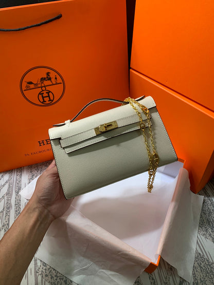 HM KELLY MINI POCHETTE 22 CRÈME EPSOM