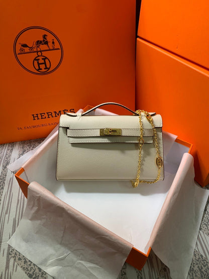 HM KELLY MINI POCHETTE 22 CRÈME EPSOM
