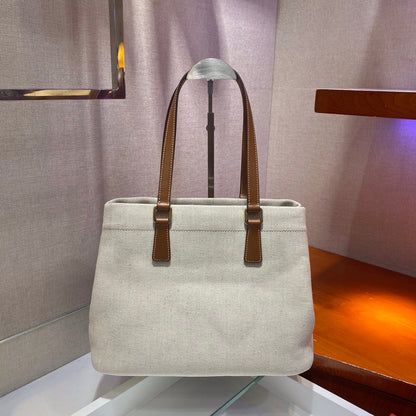 SAC CABAS 33 EN TOILE BLANCHE ET ANSE EN CUIR DE VEAU MARRON