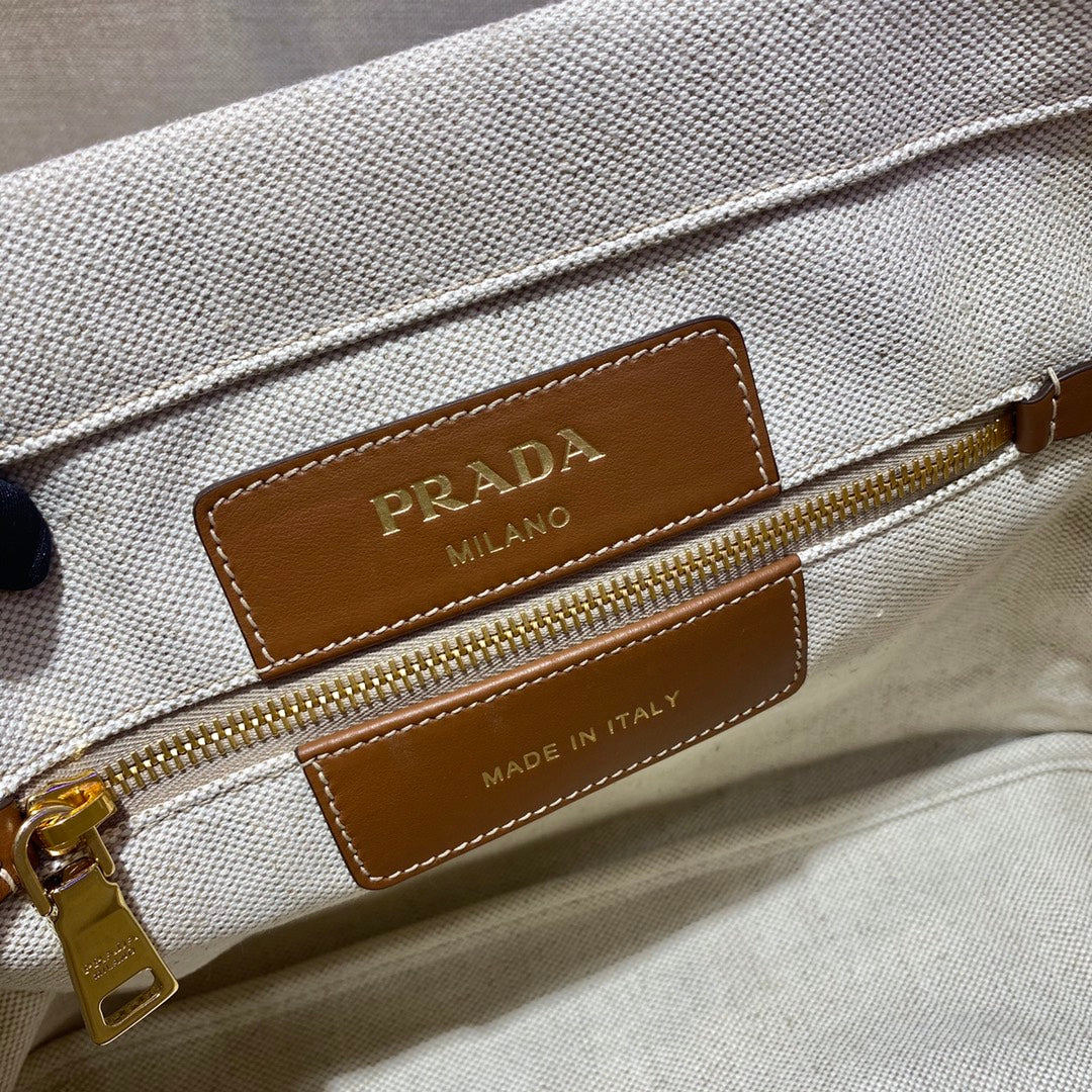 SAC CABAS 33 EN TOILE BLANCHE ET ANSE EN CUIR DE VEAU MARRON