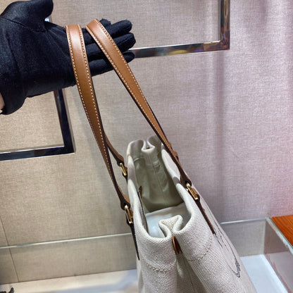 SAC CABAS 33 EN TOILE BLANCHE ET ANSE EN CUIR DE VEAU MARRON