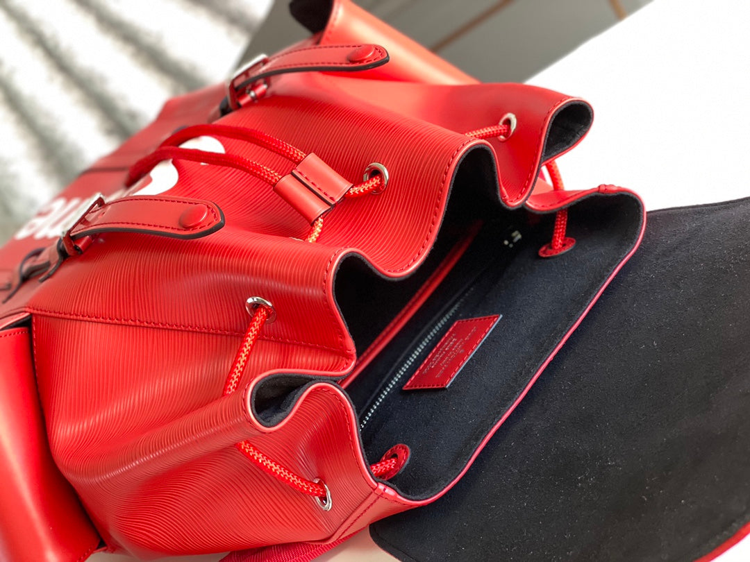Petit sac à dos LV x SUPREME CHRISTOPHER 47 en cuir de veau épi rouge
