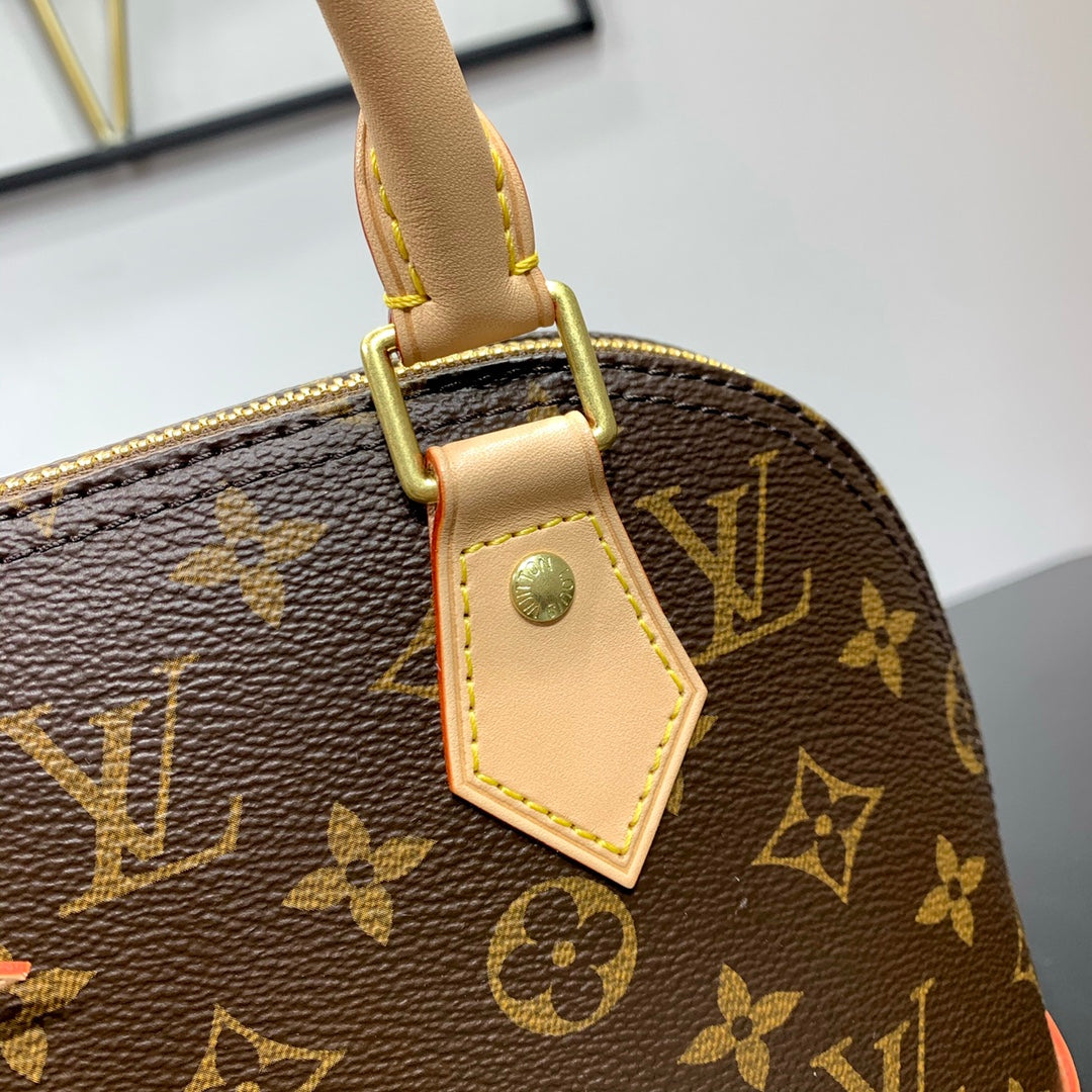 ALMA BB 23 ブラウンモノグラムキャンバスとベージュカーフスキントリム、ゴールドバックル
