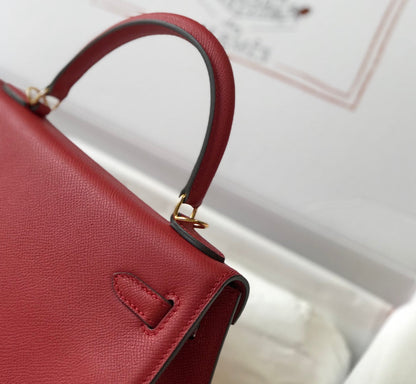 hm kelly 32 cm cuir epsom rouge foncé accessoires dorés