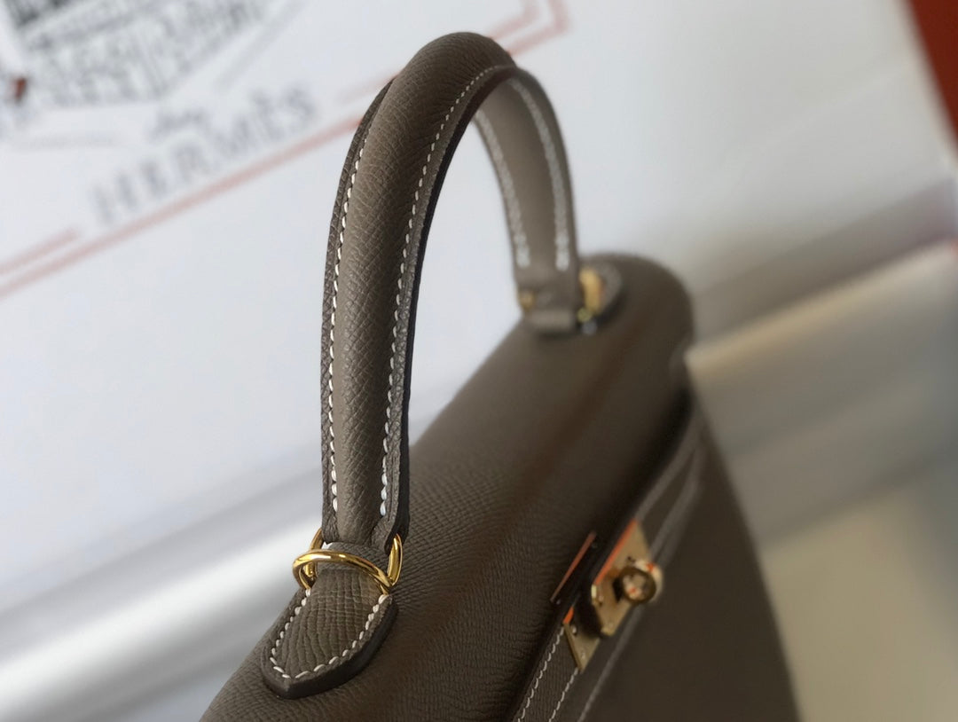 hm kelly 32 cm cuir epsom etain finitions dorées