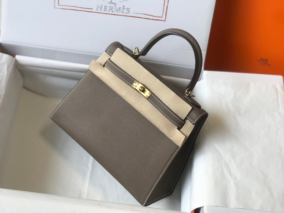 hm kelly 32 cm cuir epsom etain finitions dorées