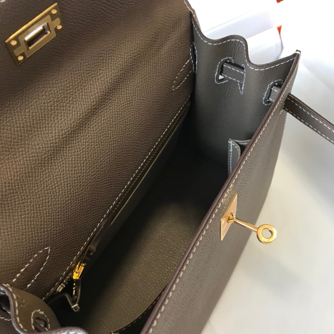 hm kelly 32 cm cuir epsom etain finitions dorées