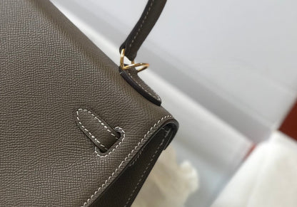 hm kelly 32 cm cuir epsom etain finitions dorées