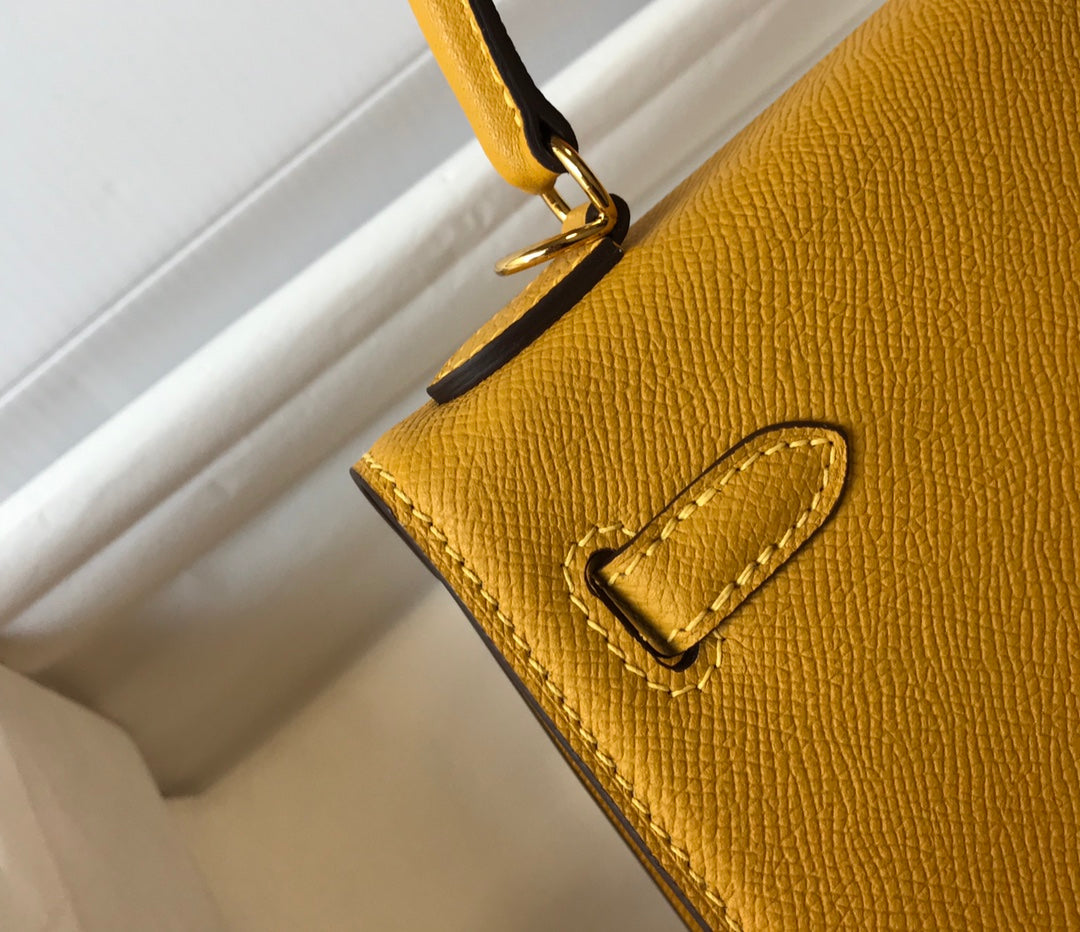 hm kelly 32 cm cuir epsom jaune ferrures dorées