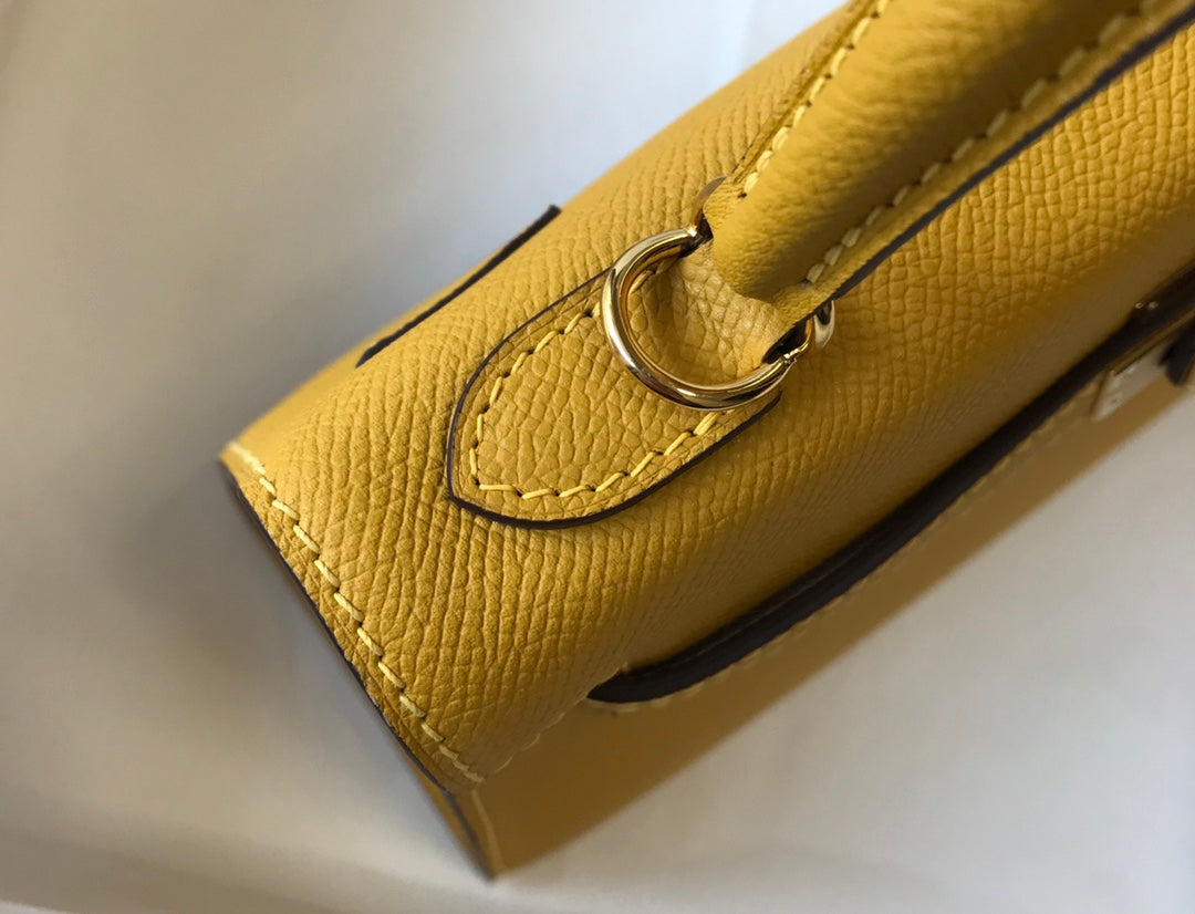 hm kelly 32 cm cuir epsom jaune ferrures dorées