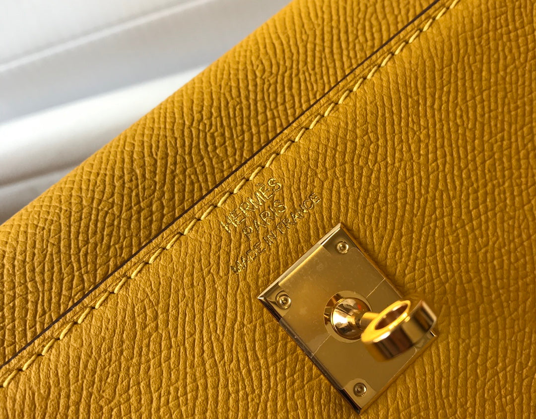 hm kelly 32 cm cuir epsom jaune ferrures dorées