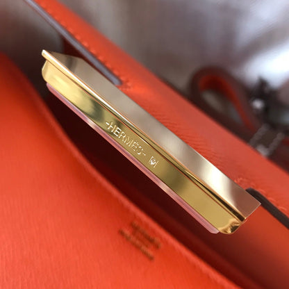 Constance 24 cuir Epsom orange rouge et accessoires dorés