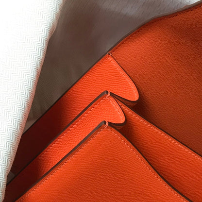 Constance 24 cuir Epsom orange rouge et accessoires dorés