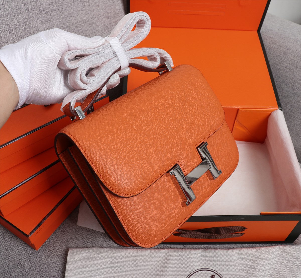 SACS HM CONSTANCE 19 ORANGE EPSOM QUINCAILLERIE ARGENTÉE