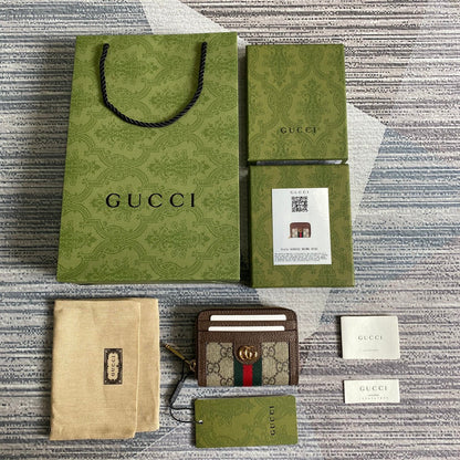 PORTEFEUILLE OPHIDIA GG 11 EN TOILE BEIGE ET ÉBÈNE